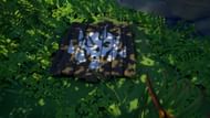 The marked position will have this spiked image, either on a wooden plank or on the ground etched in stone (Image via Rare)